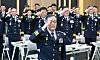 Kim Jong-chul, acting commissioner general of the National Police Agency, center, makes a salute during a leadership meeting held in western Seoul on Sept. 3.