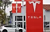 Tesla logo is displayed at a Tesla dealership on July 2 in Alhambra, California.