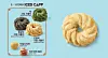 Golden braided ring pastry beside an illustrated menu panel on a light blue background.
