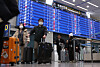 Korean and foreign travelers arrive at Incheon International Airport Terminal 1 on Feb. 18.