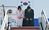 President Lee Jae Myung, right, and first lady Kim Hea Kyung depart to France for their state visit at Seoul Air Base in Seongnam, Gyeonggi, on Sept. 6.