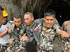 A Chinese man, center, is rescued by Nepali military personnel who were on joint rescue mission with Korea Disaster Relief Team from a tunnel for Upper Trishuli-1 Hydropower Project in Nepal on Sept. 5.