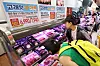 Consumers browse through beef products at a hypermarket in central Seoul on Sept. 3.