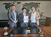Kang Se-chan, Genencell founder, center, poses for photograph with officials from Ordi Pharma FZ-LLC and DEM Pharmaceuticals for the sale of the Covid-19 treatment drugs in the Middle East and Turkey in May 2022.