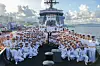 North Korean leader Kim Jong-un and his daughter Ju-ae, center, are seen in a photo taken on destroyer Kang Kon on Sept. 6, in a photo carried by Rodong Sinmun.