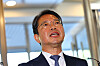 Justice Minister nominee Kim Seung-won speaks to reporters as he walks into the building with office to prepare his confirmation hearing in central Seoul on Sept. 7.