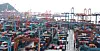 Cargo containers are piled up at Busan Port on Aug. 18.