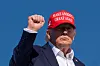 U.S. President Donald Trump gestures while boarding Air Force One at Morristown Airport on Sept. 7 in New Jersey.