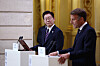 Korean President Lee Jae Myung, left, is seen with French President Emmanuel Macron during a joint statement with at the Elysee Palace in Paris, on Sept. 8.