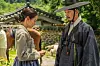 Nana and Ji Chang-wook in traditional Korean clothing during a scene from The Scandal.