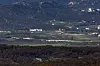 적막한 DMZ (파주=연합뉴스) 임병식 기자 = 북한이 한미일 다영역 연합훈련 '프리덤 에지' 등을 비난하고 나선 가운데 8일 경기도 파주시 접경지역에서 바라본 서부전선 비무장지대(DMZ)에서 북측이 쌓은 방벽 일대가 적막하다. 2026.9.8 andphotodo@yna.co.kr/2026-09-08 14:50:35/