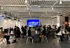 Young Korean men and women are gathered at a cafe in Seoul, taking part in a rotational speed dating event.