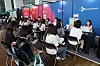 Undergraduates wait for their turn at a consultation booth at a job fair held at a university in western Seoul on Sept. 7.