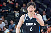 Korea's guard Lee Jung-hyun celebrates after making a 3-pointer during a group-stage game against Japan at Aichi International Arena in Nagoya on Sept. 13.