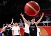 Korean basketball players celebrate their win against Japan at Aichi International Arena in Nagoya on Sept. 13.