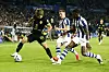 Atletico Madrid's Lee Kang-in, left, is in action with Real Sociedad's footballers in Spain on Sept. 13.