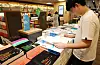 A student browses practice books for the College Scholastic Ability Test at a bookstore in central Seoul on Sept. 6.