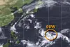 A tropical depression, named 'Invest 90W,' is seen in an image provided by the Joint Typhoon Warning Center.
