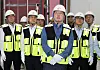 SK Group Chairman Chey Tae-won, center, inspects construction site of AI data center in Ulsan on Sept. 10.