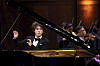 Yunchan Lim performs a concerto with the Fort Worth Symphony Orchestra conducted by Chairman of the Jury Marin Alsop in the final round of the 16th Van Cliburn International Piano Competition at Bass Performance Hall in Fort Worth, Texas, on June 12, 2022.