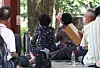 Older adults are seen in a public park in central Seoul on July 28.
