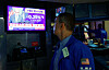 A NYSE trader looks at a screen after the Federal Reserve raised interest rates on Wednesday, in New York City, U.S. September 16, 2026. REUTERS/Jeenah Moon/2026-09-17 05:05:55/