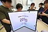 Visitors try out Samsung Electronics’ newly released Galaxy Z series, including the Z Fold8 device, at a Samsung store in southern Seoul on July 28.