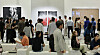 Crowd of visitors viewing contemporary artworks inside the Frieze Seoul 2026 exhibition at COEX.