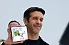 New Apple CEO John Ternus holds the new foldable iPhone Duo during Apple's event at the Steve Jobs Theater in Cupertino, California on Sept. 9.