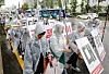 Undergraduate students stage a rally to protest against university merger and tuition hike in central Seoul on May 28, 2023.