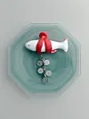 A fish-shaped magnet produced in collaboration between K-pop boy band BTS and the National Museum Foundation of Korea
