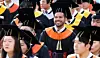 A student smiles while attending Sungkyunkwan University's graduation ceremony on Feb. 25, 2025.