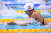 South Korean swimmer Park Si-eun competes in a breaststroke final amid splashing water and lane markers.