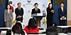 Kim Young-hoon speaks at a Seoul government briefing, with officials and journalists gathered around him.