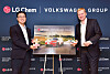 LG Chem senior vice president Kim Sang-min, left, and Volkswagen Group executive vice president Stefan Gramse pose for photograph after signing a memorandum of understanding in western Seoul in an undated photo.