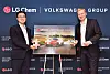 LG Chem senior vice president Kim Sang-min, left, and Volkswagen Group executive vice president Stefan Gramse pose for photograph after signing a memorandum of understanding in western Seoul in an undated photo.