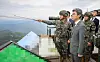 Defense Minister Kang Shin-chul, second from left, inspects defense posture near the inter-Korean border on Sept. 24.
