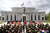 North Korean soldiers visit a memorial hall to honor troops who took part in overseas military operations in a photo carried by Korean Central News Agency on April 29.