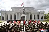 North Korean soldiers visit a memorial hall to honor troops who took part in overseas military operations in a photo carried by Korean Central News Agency on April 29.