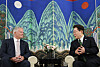 Korean President Lee Jae Myung, right, speaks with Mathias Cormann, secretary-general of the Organisation for Economic Co-operation and Development, at a hotel in Paris on Sept. 9.