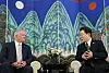 Korean President Lee Jae Myung, right, speaks with Mathias Cormann, secretary-general of the Organisation for Economic Co-operation and Development, at a hotel in Paris on Sept. 9.