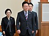 President Lee Jae Myung, center, walks before presiding over a Cabinet meeting at the Blue House in central Seoul on Sept. 29.