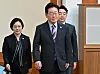 President Lee Jae Myung, center, walks before presiding over a Cabinet meeting at the Blue House in central Seoul on Sept. 29.