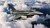 Gray fighter jet with missiles flying above thick white clouds.