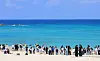A beach on Jeju Island is crowded with visitors and tourists on Sept. 12.