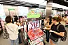 Foreign visitors shop Korean beauty products at a cosmetic store in Seoul on Sept. 20.