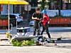 An autonomous patrol robot crashes into a table displaying flower pots in front of Hwajeong Station in Goyang, Gyeonggi, on Sept. 28.