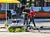 An autonomous patrol robot crashes into a table displaying flower pots in front of Hwajeong Station in Goyang, Gyeonggi, on Sept. 28.