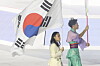 Korea's climber Seo Chae-hyun carries the Korean national flag at the closing ceremony of the Asian Games Aichi-Nagoya 2026 on Oct. 4.