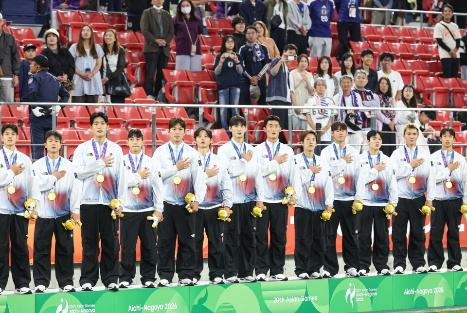 Korean footballers stand on the podium after winning gold medal at the Asian Games Aichi-Nagoya 2026 on Oct. 3.